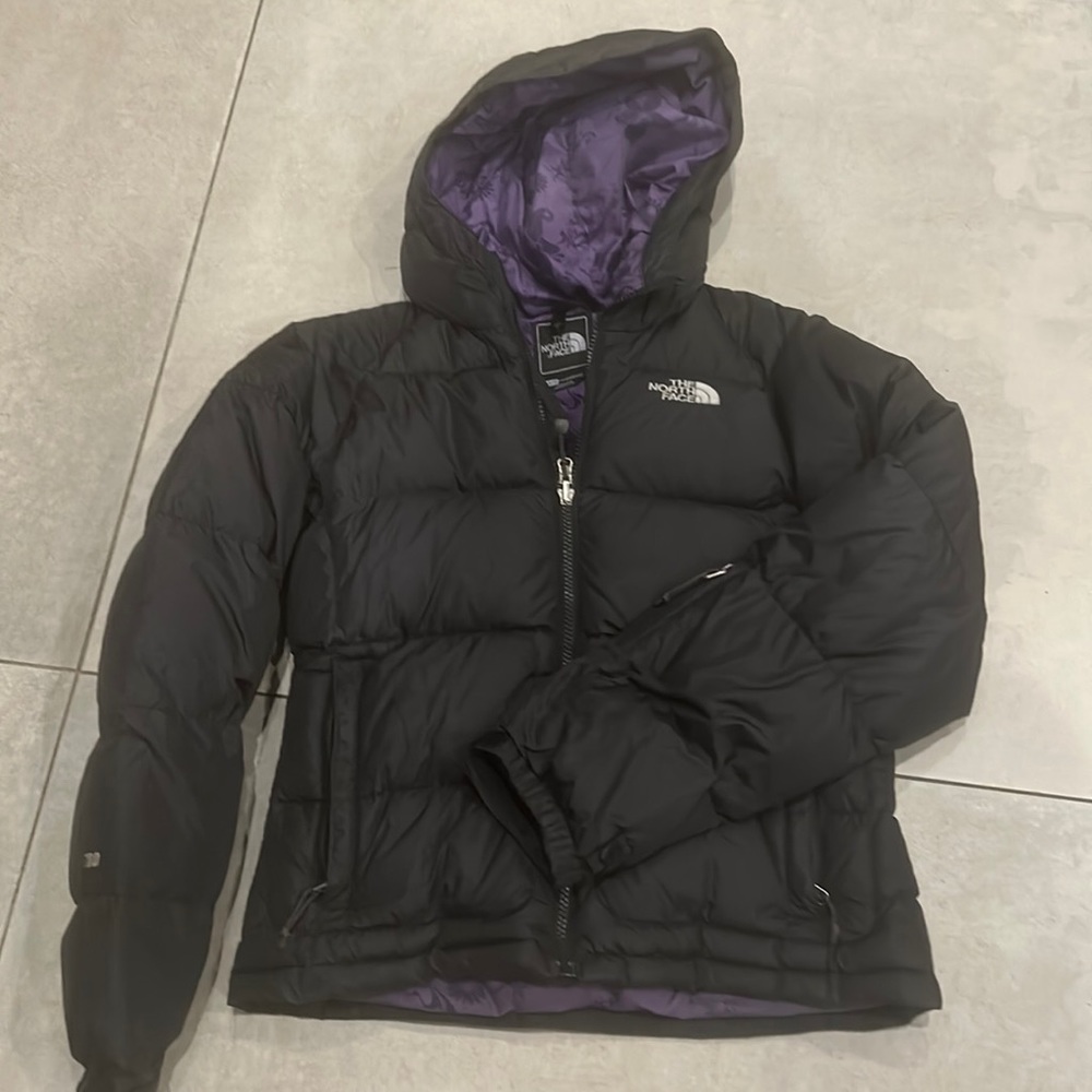 Down puffer, worn 10 times?